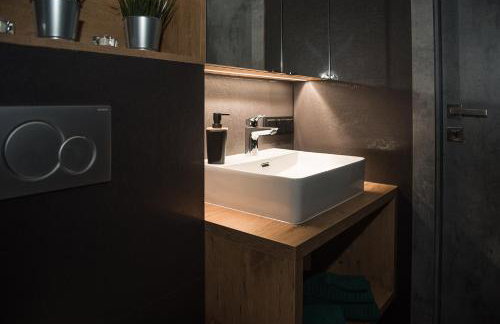 Wola Loft Apartment - Photo 14