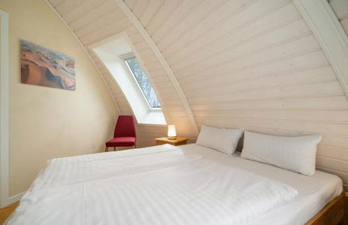 Kugelhaus Kia - Modernes Kugelhaus mit klarer Linie und Naturbezug am Tollensesee - Foto 15