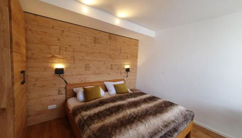 Bungalow mit Terrasse im alpinen Stil - Foto 4