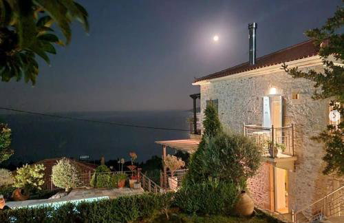 Stone house 1883 Kymi with pool - Photo 1