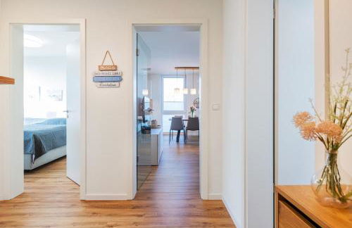 Hygge – Familienfreundliche Ferienwohnung mit Garten & Meerblick - Foto 13