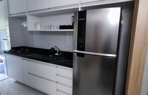 Apartamento novo a 350 m da praia das Toninhas em Ubatuba - 2 dormitórios sendo 1 suite, piscina, varanda gourmet com churrasqueira, ar condicionado, cozinha completa, garagem privativa - Foto 15