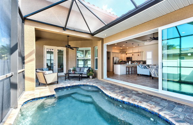 Amalfi Vacation Rental: Stylish 3-BR Retreat Steps from Vanderbilt Beach. Relax by the Private Pool and Enjoy Modern Amenities. Ideal for Families with Easy Access to Mercato and Local Attractions - Photo 1