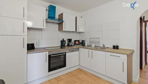 BEGE APARTMENTS WorkLounge - Photo 4, stove, dishwasher