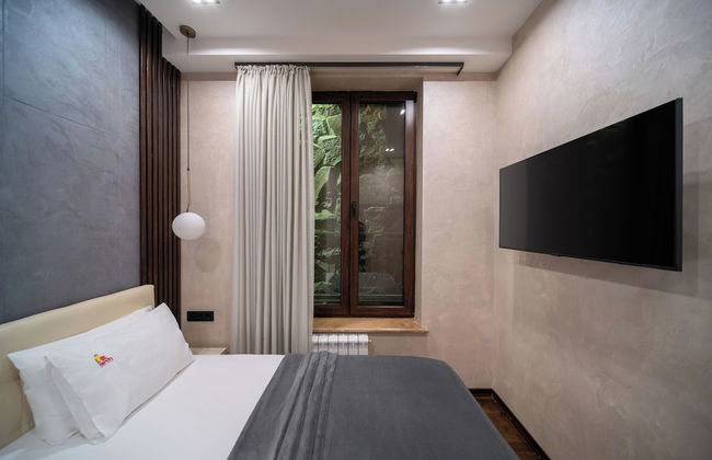 Arch Apart Hotel - Photo 8