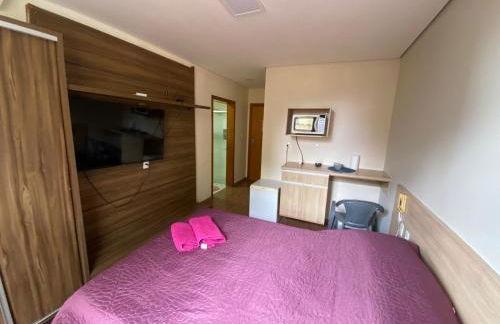 Flats da Júnia excelente localização, wi-fi, tv, ar, frigobar, garagem - Foto 19