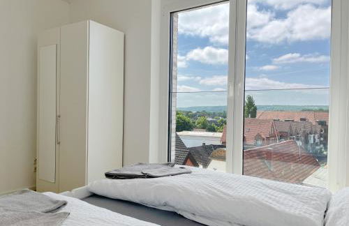 Moderne Apartments im Herzen der Stadt I private Tiefgarage mit Ladesäulen I home2share - Foto 42