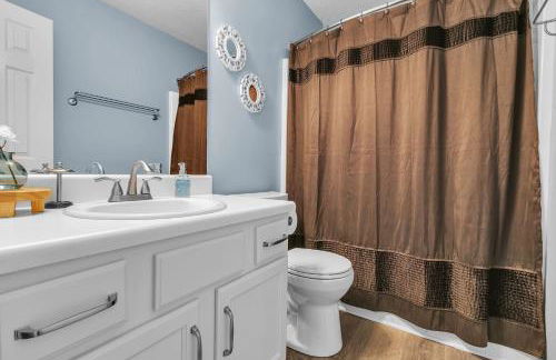 Modern 6BR Haven with Playroom, Gym & Deck! home - Photo 17