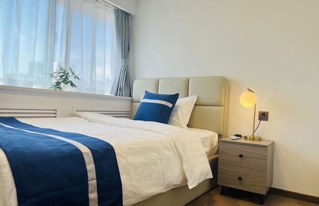 Beijing Jiuxian Apartment - Foto 5