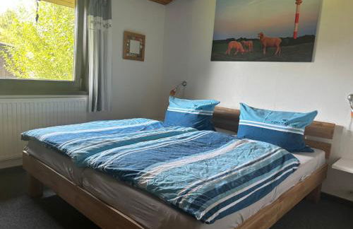 Urlaub beim Käptn! Freistehendes Premium Nordsee-Ferienhaus mit Fahrrädern, Stellplatz und Garten, 150m zur Nordsee - Foto 5