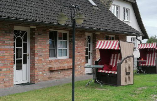 Boddenhus auf Rügen - Ferienwohnungen und Pension - Foto 24