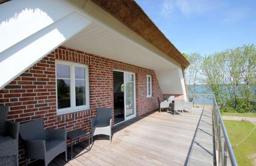 wassernahes Ferienhaus mit Meerblick und Schwimmbadnutzung in Sellin - Ferienhaus Rohrweihe - Foto 27