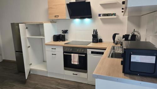 Modern Living nearby RheinHafen mit Balkon und Parken - Apolonia Living - Foto 3, stove, toaster