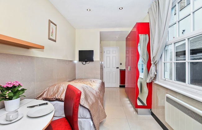 Baker Street Suites - Photo 15