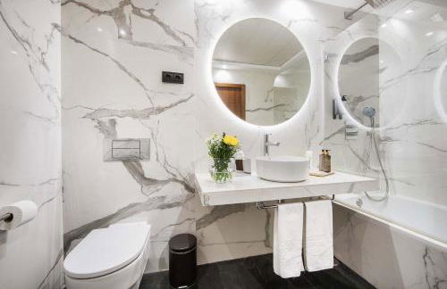 Apartosuites Jardines de Sabatini - Photo 18