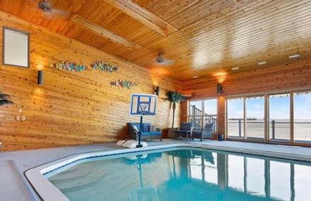 6BR Houghton Lake House with Indoor Pool, Hot Tub and Golf Simulator - Photo 1