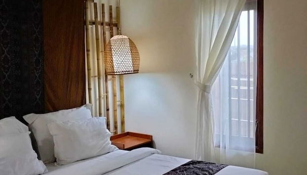 Villa New D'Bamboo by Plesirhatiyogja - Foto 4, Habitación