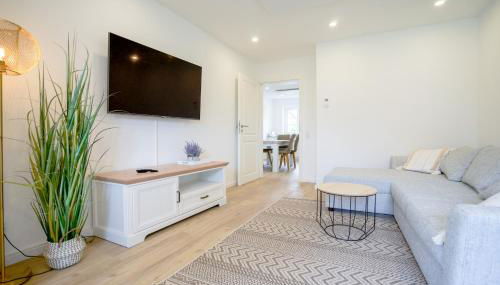 Sonnenterrasse - Helle & moderne Ferienwohnung am Meer - Foto 4