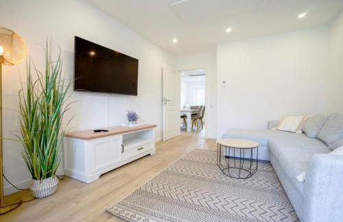 Sonnenterrasse - Helle & moderne Ferienwohnung am Meer - Foto 4