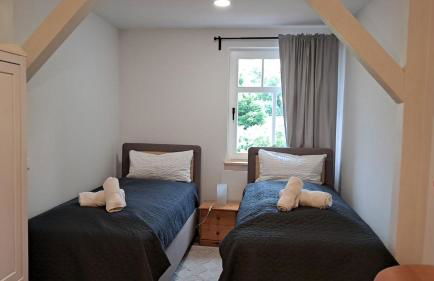 Modernes Ferienhaus mit 4 separaten Appartements, je mit vollausgestatteter Küchenzeile und eigenem Bad, 2 Gehminuten zum Badesee, Garten, Grillplatz, Kinderspielbereich, Hunde sind willkommen - Foto 11