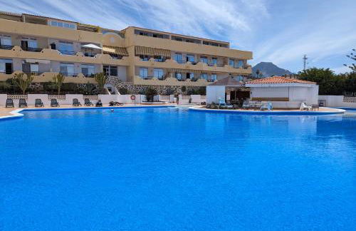 Comfortable 2-Bedroom Duplex in Playa Paraiso with Ocean View, Balcony, and Shared Pool - Photo 11