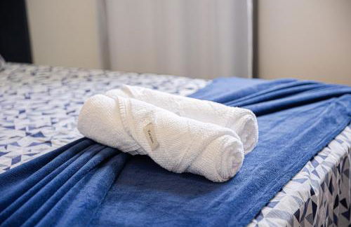 Aconchego e privacidade para sua família com 2 quartos, sala e cozinha integrados e sacada com churrasqueira - Foto 10