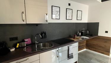 Charmante Ferienwohnung mit großer Dachterrasse & Wintergarten - Foto 2, stove