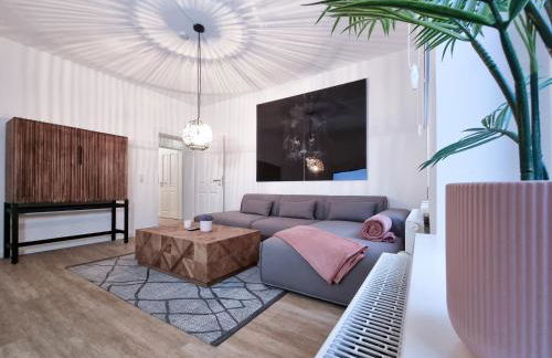 Alpha Apartments - Photo 1