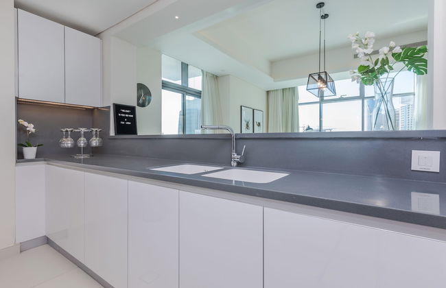 FAM Living - Mada Residences Downtown - Photo 18