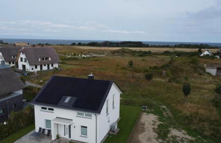 HausLIEBLINGSPLATZ - am Meer - Luxus Villa mit 4 Schlafzimmern, 3 Badezimmern Sauna, Kamin, Weber-Grill und Wallbox - Foto 18