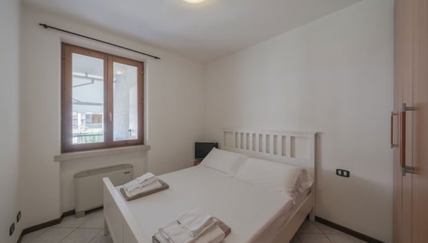 Apt24 - Trilocale Vicino al Lago con Posto Auto - Foto 2, Habitación