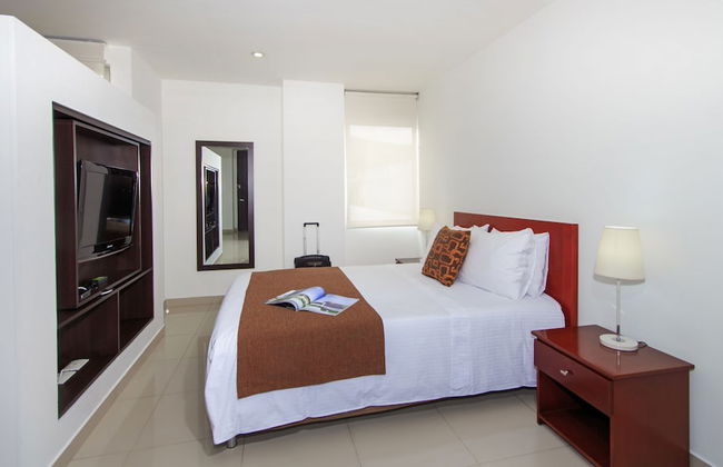 122 Plaza Apartahotel - Photo 10