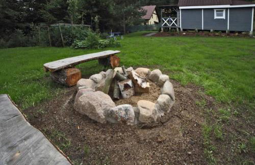 Drewniany domek nad jeziorem w Sitnie - Foto 11