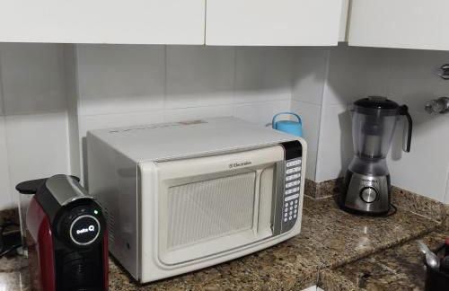 Apartamento Dulce Pitangueiras Guarujá com varanda - Foto 12