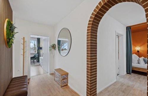 MAISUITES Sperling - Zentrale Ferienwohnung mit Boxspringbett, Kaffeevollautomat, WLAN & seitlichem Seeblick - Foto 18