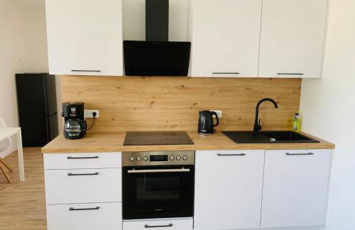 FEDDERSEN LIVING Kernsanierte Ferienwohnungen - Gemütlich - Netflix - Voll ausgestattet - zentral - Foto 41