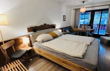 Fewo mit toller Dachterrasse & Bademantelgang zur Wohlfühltherme im neuen Stil - Foto 1