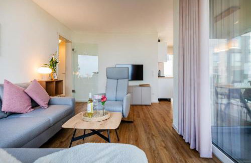 Hygge – Familienfreundliche Ferienwohnung mit Garten & Meerblick - Foto 16