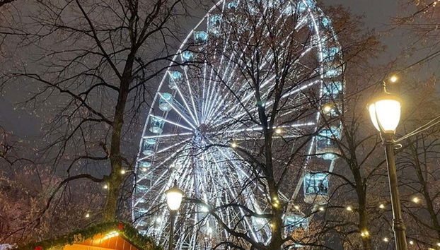 Admire the illuminated Ferris wheel in Oslo