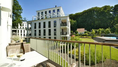 Ferienwohnung Strandlounge in den Parkvillen Binz - Foto 3, Garden view