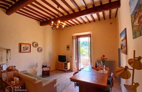 INCANTEVOLE CASA TOSCANA con travi in legno, ampia terrazza e vista sulle colline - Foto 13