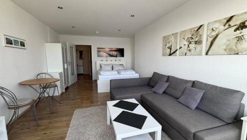 Penthousewohnung mit traumhaften Ausbilck auf den Segeberger See - Foto 1