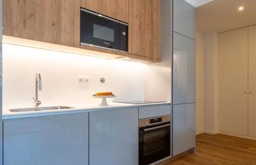 Sleek & Modern Flat w/ Private Garage by HostWise - Photo 20