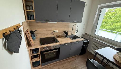 Messe Essen, Modernes Apartment mit Küche, Balkon & Self-Check-in - Foto 3, stove, dishwasher, toaster