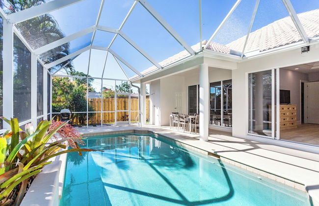 Imola: Newly Remodeled Pool Home Minutes from Vanderbilt Beach. Family-Friendly Retreat with 4 BR, 3.5 Bathrooms, and Private Screened Pool. Perfect Location Near Mercato and Naples Attractions - Foto 32