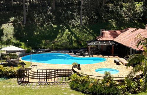 Casa 05 Vale Boa Vista - Refúgio Moderno em Condomínio Exclusivo - Photo 6