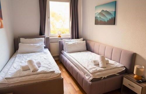 Modernes 5-Personen Apartment mit kostenlosen Parkplätzen, Boxspringbetten, WLAN, 3x TV, vollausgestatteter Küche - Foto 6