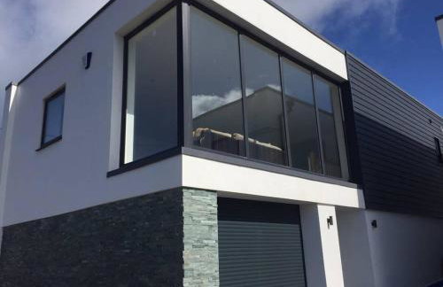 Relax in style at my stunning Holywell Beach home - Foto 6