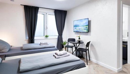 ALFA Stuttgart Mikro-Apartment 2 Betten Küche Bad l SmartTV WIFI l Porsche & Bosch l 2 Beds Kitchen Bath BS21A1 - Foto 2