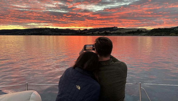 A couple admiring the sunset